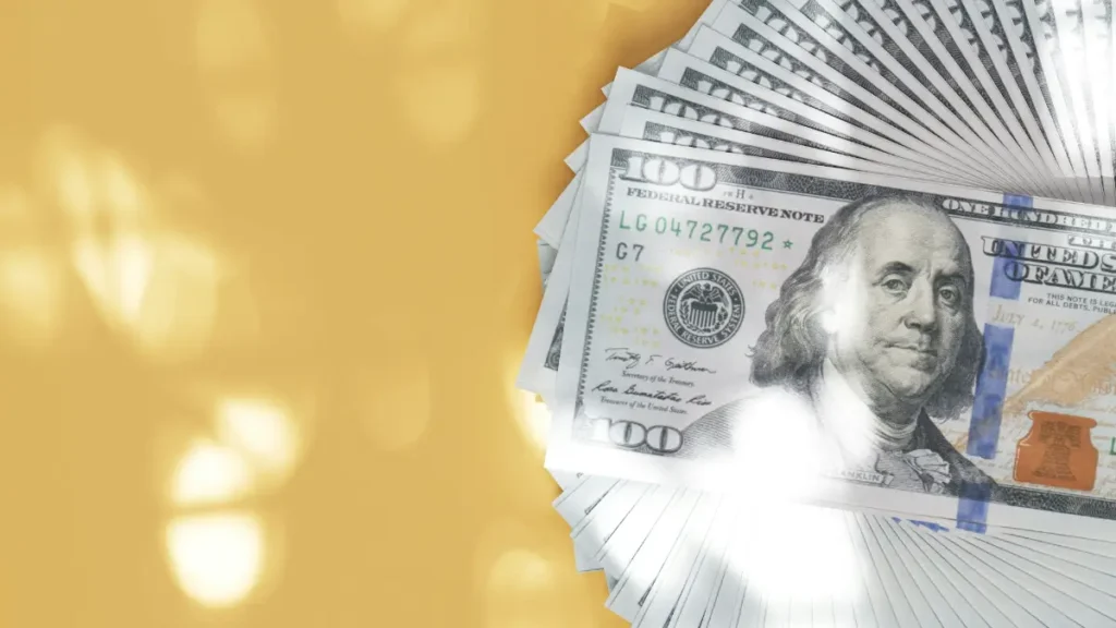 A stack of one-hundred dollar bills